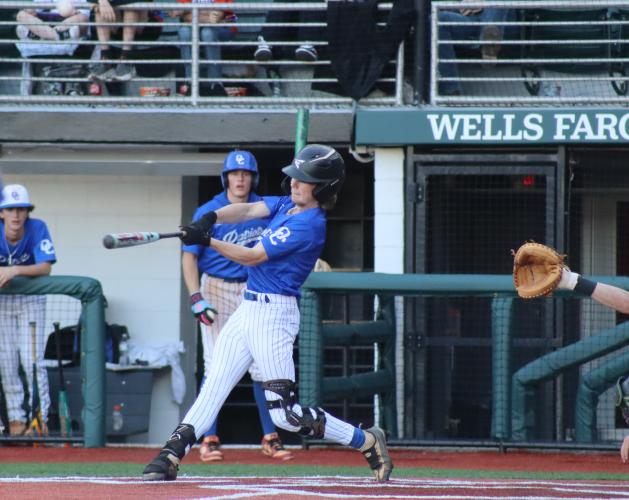 OCHS senior Nash Campbell is taking a swing at the game against Athens Academy at Foley Field on Tuesday, March 18. The Patriots fell to the Spartans 2-5. (Photo/ Kayda Hammock)