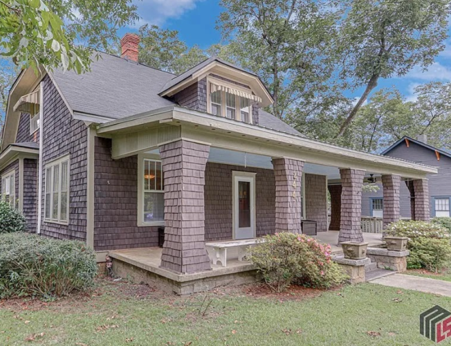 The front side of the home before the renovations. The Kee's say that the remodel will maintain the stone columns on the porch using locally sourced granite. (Submitted Photo)