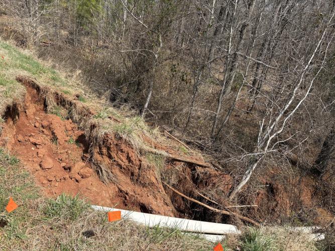 Resident Joe Forrester’s land has been impacted by the runoff from the Timberland Solar Project, ruining a dam located on his property. “The water that came off the solar farm washed a lot of debris down and stopped these pipes up," said Jeff Sharp, the county’s director of planning, zoning and compliance. (Photo/Emery Pikel)
