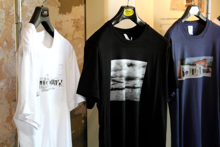 Tom Thon sells his T-shirts for the first time at his art show at the Oglethorpe County Historic Jail on Saturday, April 12. The T-shirts are his most recent art project and this was the first time he had debuted them. “(It was) the first time I've shown any T-shirts anywhere, just to see what the reaction is, and try to make a decision as to whether or not to continue to pursue that medium,” Thon said. (Photo/Emily Slepsky)