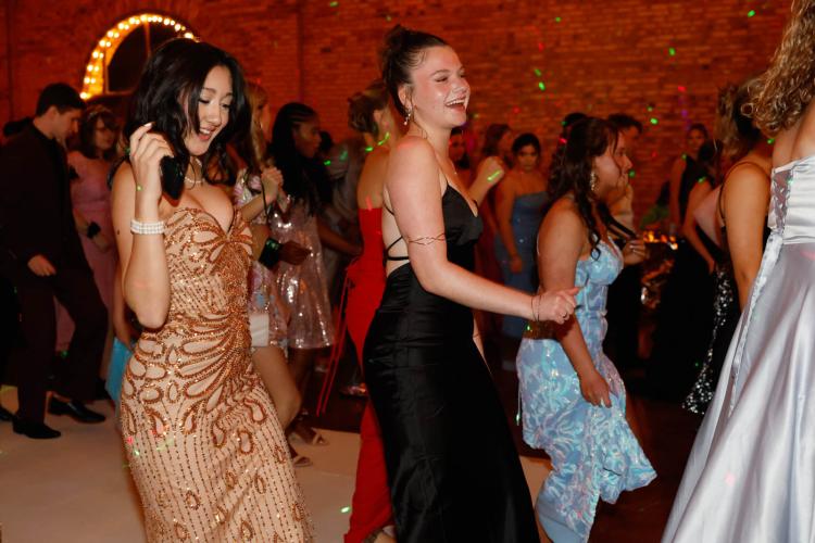Flor Padilla and Jada Ralston dance at the 2025 Oglethorpe County High School Prom at Historic Smithonia Farm in Colbert, Georgia on Saturday, April 12, 2025. (Photo/Libby Hobbs)