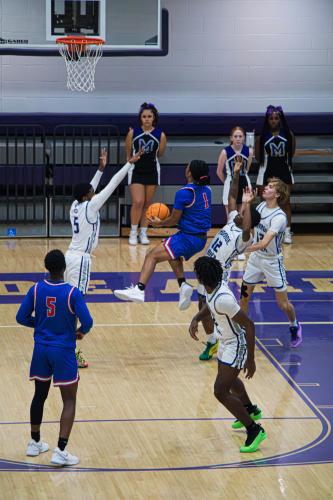 Jordan Johnson goes in for a basket in a game against Monroe Area. (Submitted photo)