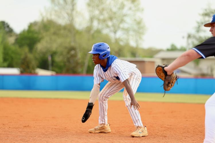 Rico Howard leads off first in the first game of Oglethorpe County's doubleheader against Banks County last Friday. The Leopards swept the Patriots to remain in first Region 8-A Division I. (Photo/Ty Johnston)