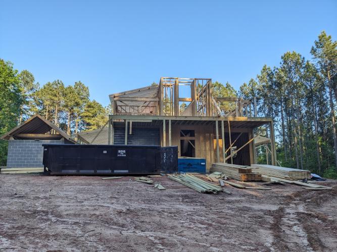 Anastasia Davis’s home, under construction, sits on 31 acres in Maxeys. The barn’s initial construction included only the roof framing. “I have been involved with horses since I was six years old, and I was very involved with horses as a young girl,” Davis said. “Not because of changes in life and my styles, but then throughout the years, as I got older, I reconnected with horses and I have friends who have horses.” (Photo/Anastasia Davis)
