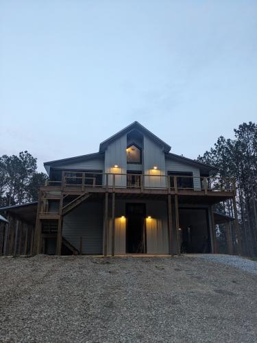 Anastasia Davis’s new home is in Maxeys on Sunday, March 30. “I own and live on 31 acres of forest,” Davis said. “So I had a vision of where the house was going to go, so we sat down together and we designed it, and I pretty much gave her my design, and she sketched it on her notepad, and then she, of course, added some of her own design things.” (Photo/Anastasia Davis)