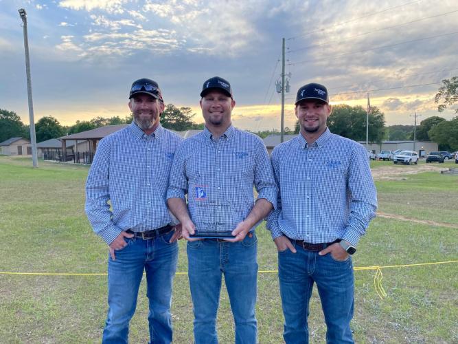Jackson EMC linemen Cody Watson, Brandon Sanders and Easton Tuggle placed fourth out of 27 journeyman teams at the Georgia Lineman’s Rodeo on May 3. They advanced to the International Lineman’s Rodeo and Expo later in October. (Submitted Photo)