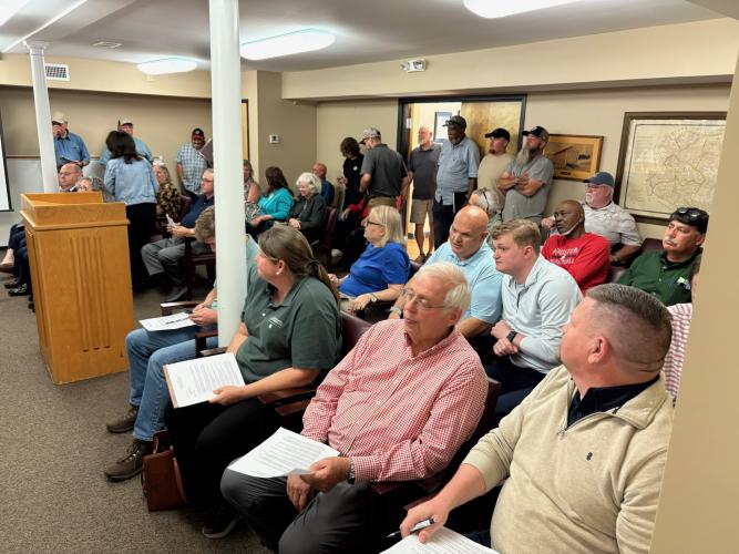 Residents pack the meeting room during the Board of Commissioners meeting on Monday night. A series of rezoning items caused concern throughout the county, leading to the overflow crowd. (Photo/Dink NeSmith)