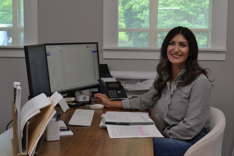 Teresa Jo Campbell works in her new role as Oglethorpe County’s planning assistant and permitting coordinator. Campbell, who worked as a clerk and elections assistant in the probate court, began this job in January. (Photo/Lilly Stone)