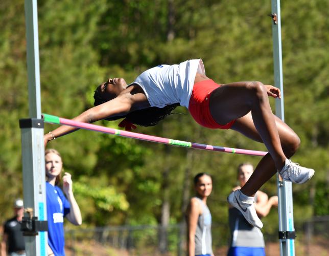 Kenzie Henderson tied for the top high jump at the Class A Division I sectional on Monday to advance to the state meet. She’s won three straight high jump state titles. (Photo/Wade Cheek)