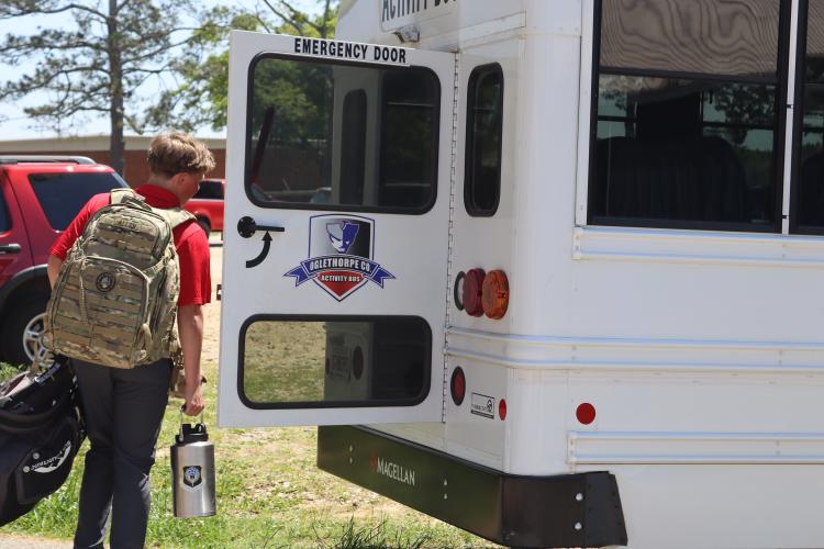 The OCHS golf team loads up the activity bus to head to their golf tournament in Lincolnton. (Photo/Kayda Hammock)