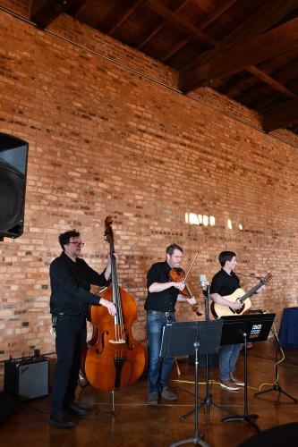 The Comer String Collective performed live music throughout the night at the Madison Oglethorpe Animal Shelter's 10th annual Bark &amp; Wine fundraiser. (Photo/Jennifer Xia)