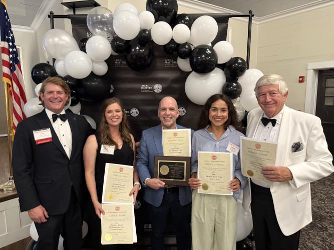 Members of The Oglethorpe Echo staff show several of the awards the paper won at the Georgia Press Association’s Better Newspaper Contest. Eric NeSmith, president of the Georgia Press Association, (from left) is pictured with The Echo business manager Trisha Bearden, editor Andy Johnston, marketing manager Lourdes Boyd and Dink NeSmith, chairman of The Oglethorpe Echo Legacy Inc. (Submitted Photo)