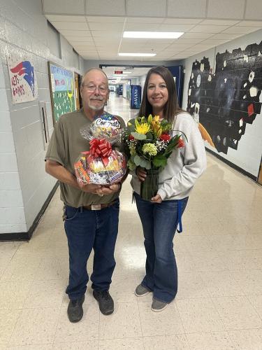 Custodian Carl Young (from left) and healthcare sciences teacher Erin Bunch pose for a photo last September following their recognition as Classified Staff and Teacher of the Year respectively. Bunch said she feels “very appreciative” of her peers to select her to represent the school system as System Teacher of the Year. (Submitted Photo)