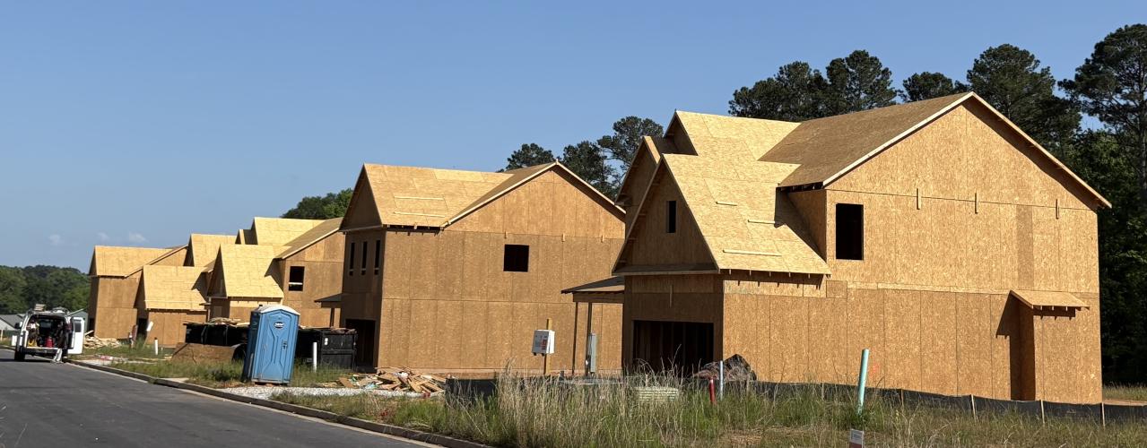Five homes are under construction in The Pines at Grove Creek, a development off Bunker Hill Road. The first 10 homes, which were built last year, have sold. (Photo/Dink NeSmith)
