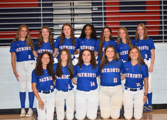 Some of the players on the OCHS softball team pose for media day photos Wednesday, July 23 at the school. Finley Sullivan, Nova Hokanson, Haleigh Baker, Zharia Burgess, Riley Jones, Reese Campbell, Tristin Caldwell (back row, left to right), Emily Wisham, Khloe Eidson, Morgan Davis, Carolyn Barner and Jayden Ford (front row, left to right) are pictured. (Photo/Emma Greene)