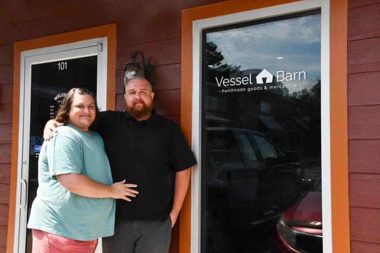 Dustin and Tara Wood opened their new store Vessel Barn in Oak Tree Plaza on July 5. The couple sells candles, wax melts, apparel and other handmade products. (Photo/Jennifer Xia)