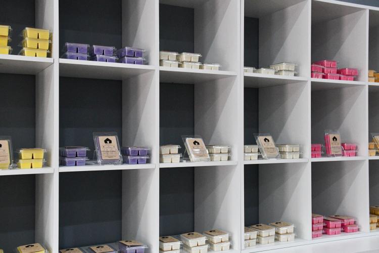 A variety of scented wax melts sits on a shelf in the newly opened Vessel Barn. The local business will also sell candles, apparel and other mercantile. (Photo/Jennifer Xia)