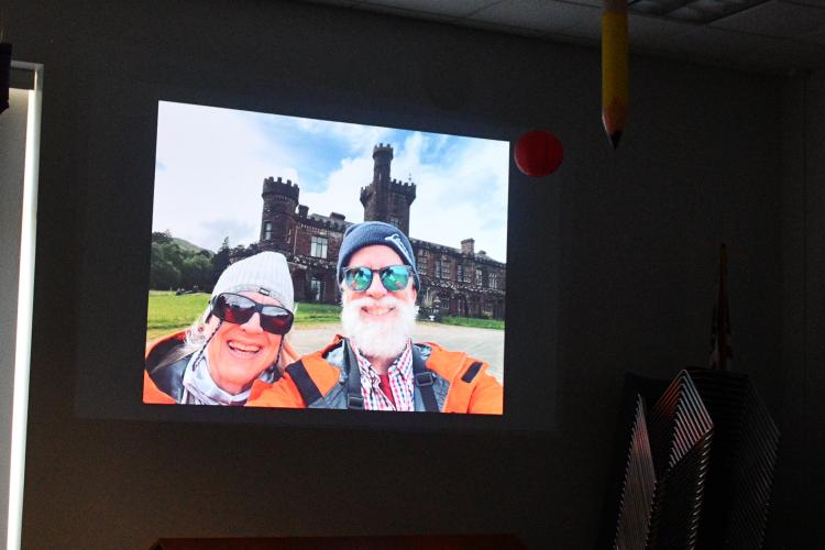 Amy Edwards and Steve Hilliard show a selfie from one of their many travels during their presentation at the Oglethorpe County Library on Monday. The couple met in graduate school at the University of Georgia and have traveled together ever since. (Photo/Jennifer Xia)
