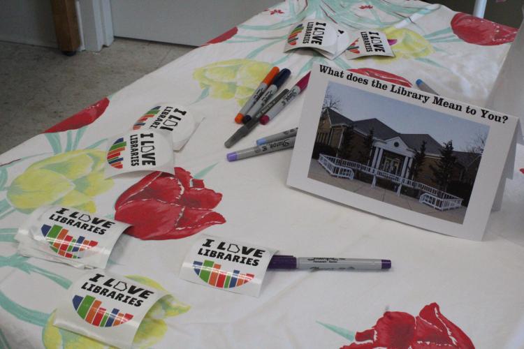 There were party favors and a card for attendees to sign at the library building’s 30th anniversary. Many said they've been happy to watch the library grow as a place for learning, but also a space for the community to gather. (Photo/Elizabeth Kim)