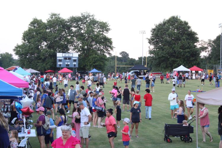 Festival goers explore the more than 51 food, drink and craft vendors at the Fourth of July celebration at Bryan Park. There were twice as many vendors at this year’s event than in previous years, said Michael White, the director of the Oglethorpe County Recreation Department. (Elizabeth Kim)