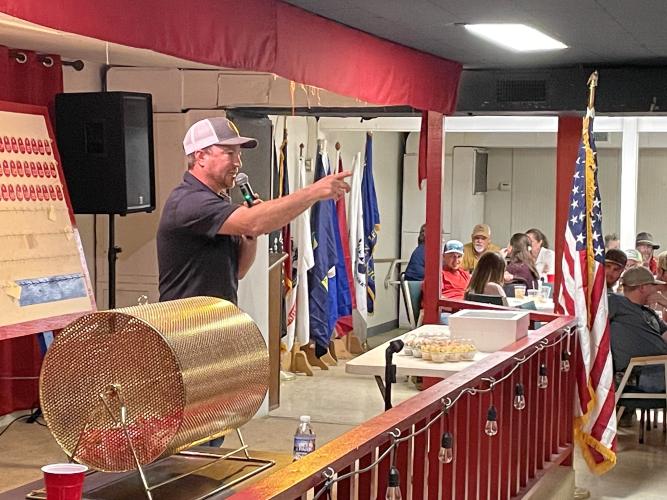 Jake Willcox auctions off an item at the Oglethorpe County Athletic Booster Club's Patriot Powerball fundraiser in 2023. The Patriot Powerball is the biggest fundraiser of the year for the OCABC and helps fund middle and high school athletics. (Photo/Gray Jones)
