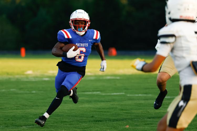 Oglethorpe County running back Paris Crowder (6) carries the ball for the Patriots in the first quarter during Oglethorpe County’s game against the East Hill Vikings at Oglethorpe County High School on Saturday, Aug. 23, 2025. (Photo/Sofia Yaker, sofyaker@gmail.com)