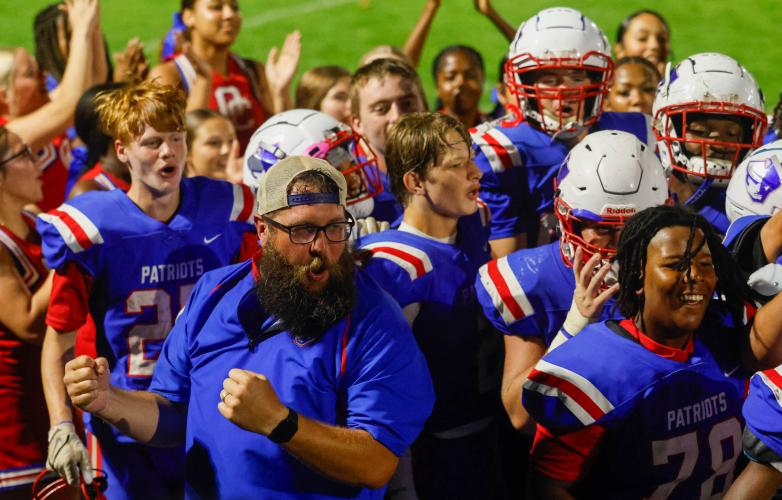 Offensive line coach Josh Austin celebrates Oglethorpe County High School football's win against East Side on Saturday, Aug. 23, 2025. (Photo/Caroline Newbern)