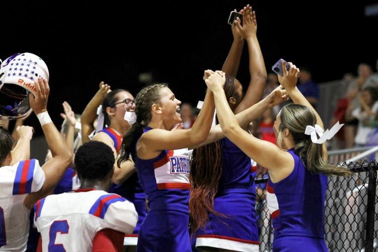 Oglethorpe County High School cheerleaders, players and fans cheer after winning the football game against Washington Wilkes Comprehensive High School at Tiger Stadium in Washington, Georgia, on Aug. 29, 2025. The game ended with a score of 42-12. (Photo/Susanna Johnson)