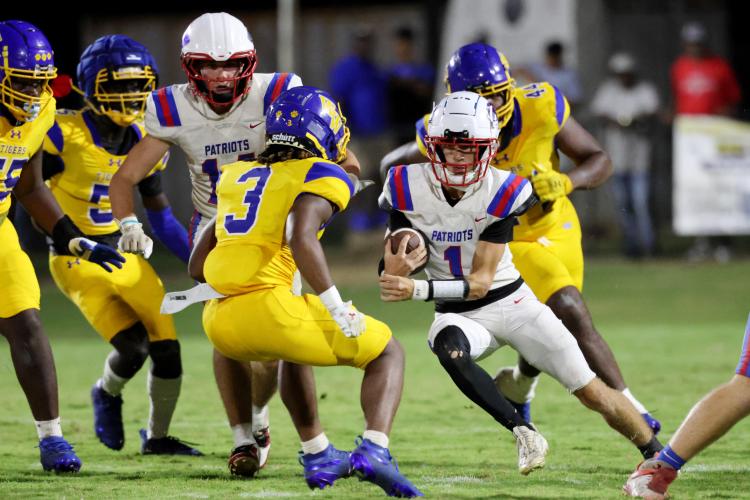 Oglethorpe County High School senior Caden Hartrum (1) runs with the ball during a game against Washington-Wilkes Comprehensive High School at Tiger Stadium in Washington, Georgia, on Aug. 29, 2025. (Photo/Katherine Davis)