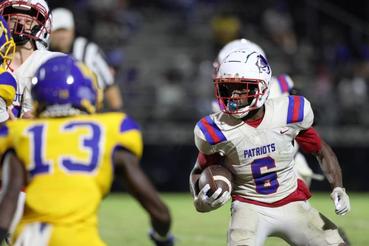 Oglethorpe County High School junior Paris Crowder (6) runs with the ball during a game against Washington-Wilkes Comprehensive High School at Tiger Stadium in Washington, Georgia, on Aug. 29, 2025. (Photo/Katherine Davis)