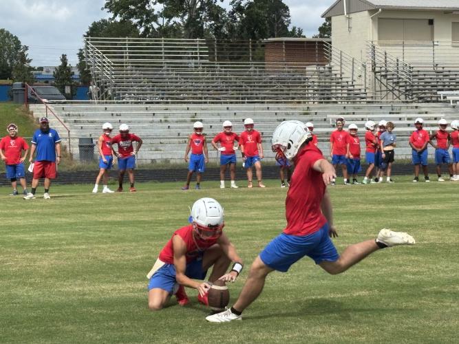 Braxton Edmondson kicks a field goal during practice last. Edmondson returns for his senior season after kicking for the Patriots last year. (Photo/Andy Johnston)