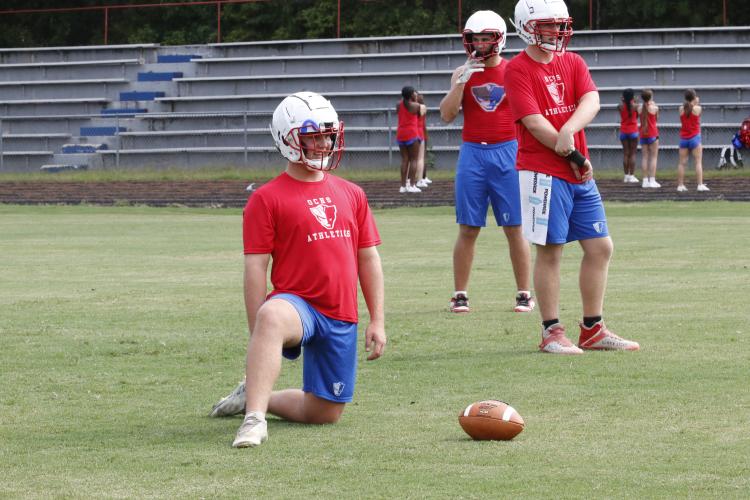 Senior Tanner Mckie works at nose tackle during a practice last week at OCHS. Coleton Sexton, Stephen Berlin and Brett Liedberg are projected as the starters this season. (Photo/Andy Johnston)