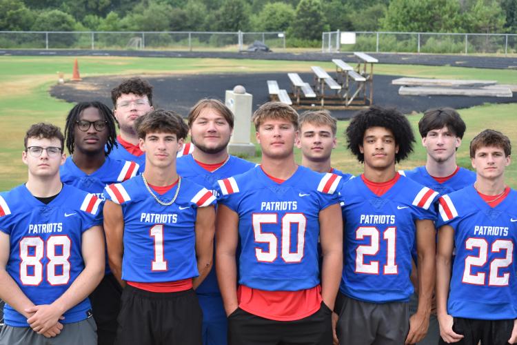 Seniors on the OCHS football team include Braxton Edmonson (88), Caden Hartrum (1), Tanner Mckie (50), Malik Forshee (21), and Clint Graham (22), (middle, from left), O’Maury Huggs, Stephen Berlin, Dalton Hilley and Keagan Moats, and (back) Brock Barrett. The Patriots will try to improve on last year’s winless record this fall. (Photo/Emma Greene)