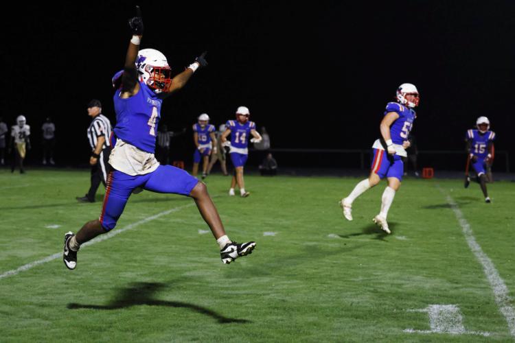 Oglethorpe County senior defensive back Nicah Pass, jumps in the air the celebrate his game winning pass deflection against the East Hall Vikings on Saturday, August 23, 2025, in Lexington, Georgia. This marks the end of a Patriots losing streak dating back to the 2023 football season. (Photo/Jackson Bramlett, The Oglethorpe Echo)