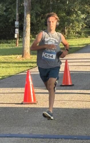 ANDY JOHNSTON/THE OGLETHORPE ECHO Cory Tillman, who runs for the Oglethorpe County cross country team, was the top finisher in the Restoration Run 5K on Monday. His teammates also ran in the 21st annual race.