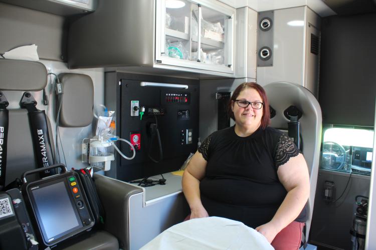 Kristin Gilliam sits inside an Oglethorpe County EMS truck on Thursday, Sept. 11, in Crawford, Georgia. Emergency medicine is her passion, and she loves being on the front lines helping her community. (Photo/Gabrielle Gruszynski)