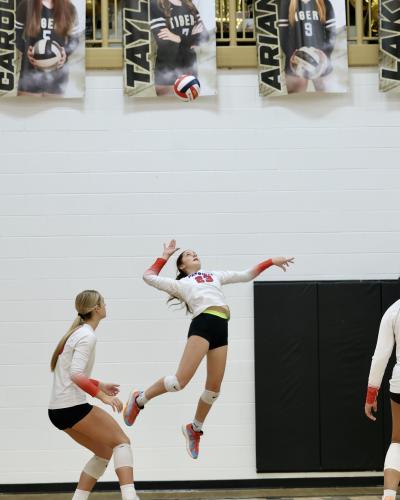 Freshman Naomi McPeake soars to make a shot in the Oglethorpe County volleyball team’s victory over Commerce on Sept. 11. The Patriots extended their winning streak to seven matches with a win over Prince Avenue on Tuesday. (Ty Johnston/The Oglethorpe Echo)