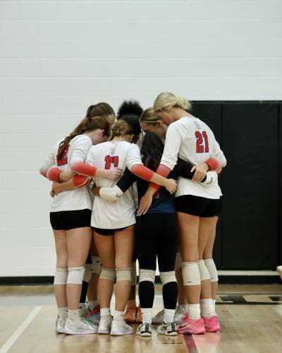 Members of the Oglethorpe County volleyball team huddle during a recent match. The Patriots won their seventh consecutive match on Tuesday to improve to 19-8 this season. (Ty Johnston/The Oglethorpe Echo)