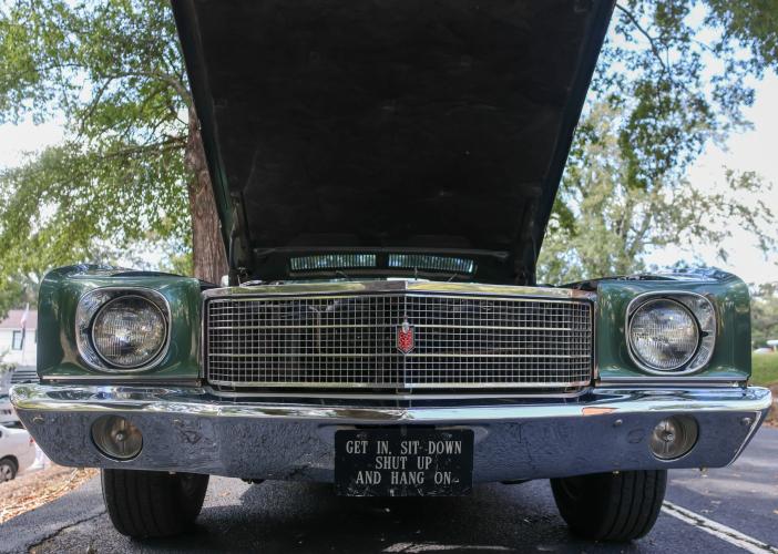 A 1970 Chevrolet Monte Carlo is displayed with its hood open at the Firefly Cruise-In in Lexington, Georgia on Sunday, Sept. 28, 2025. Competitors were asked to keep their hoods open as judges came around to observe the vehicles. (Photo/Susanna Johnson)