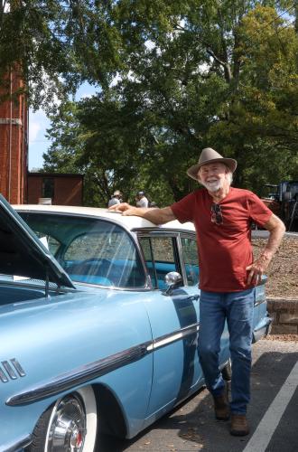 Roy Bell stands next to his 1958 four-door Chevrolet Bel Air, named "Maude," at the Firefly Cruise-In in Lexington, Georgia on Sunday, Sept. 28, 2025. Bell named the car after his great aunt, Maude Bell, who he said was "the most wonderful human being in the world." (Photo/Susanna Johnson)