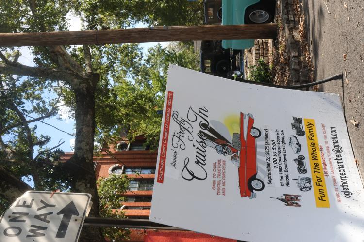 A poster welcomes guests to the Firefly Cruise-In in Lexington, Georgia on Sept. 28, 2025. The event was free for attendees but cost $10 for vehicle entries. (Photo/Susanna Johnson)