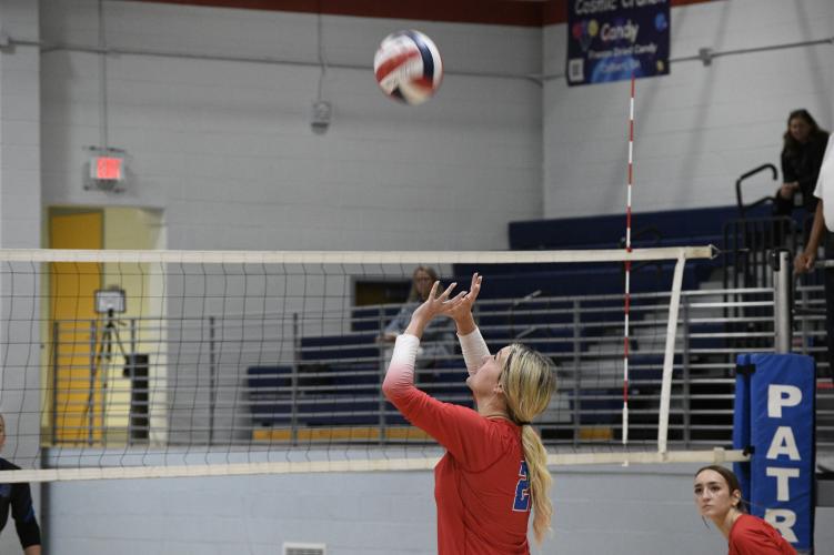 Elizabeth Cook sets for a teammate during the Oglethorpe County volleyball team’s victory over Lake Oconee Academy. Cook and Leanna Newton are two of the top players on the team. (Andy Mathis/The Oglethorpe Echo)