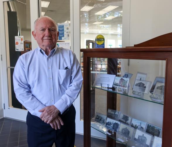 Part of Gary Doster's postcard collection is on display at the Oglethorpe County Library. The library reached out to Doster, who lives in Athens, about displaying them because it had heard about his postcard collection. (Photo/Susanna Johnson)