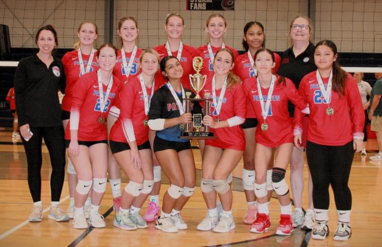 Members of the Oglethorpe County volleyball team gather for a photo around the Area 8-A trophy. The Patriots advanced to the state tournament, which begins Oct. 15. (Submitted Photo)