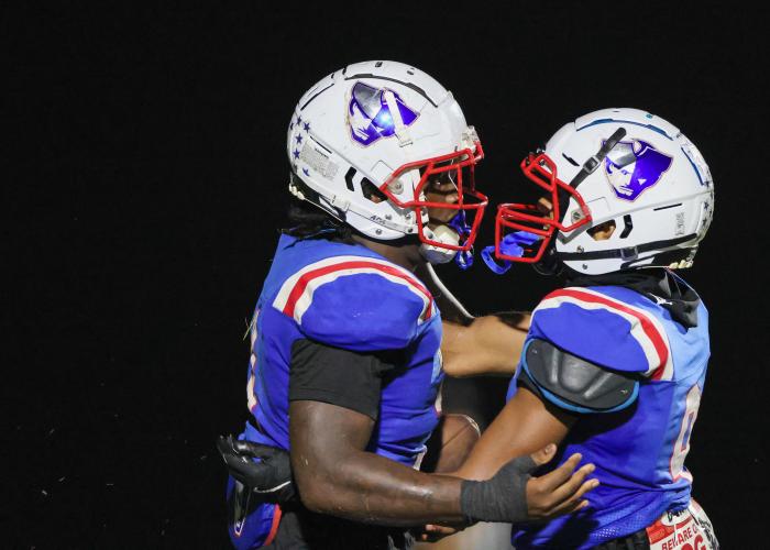 Omaury Huggs celebrates with Keyvon Gresham after retreiving the ball on Friday, Sept. 26, 2025, in Lexington, Georgia. (Photo/McKenna Edwards)