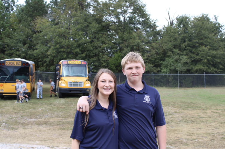 Oglethorpe County FFA officers Andee Dellinger, a senior, and Landon Howard, a junior, helped guide visiting students around campus during the Area 2 competitions Thursday. Schools from across northeast Georgia traveled to Oglethorpe County to compete in career development events. (Photo/Ella Jones)
