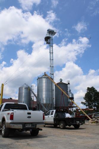 The grain elevator at Oglethorpe Feed and Hardware Supply stretches 125 feet from the ground and provides efficient unloading and loading of feed. The Sanders have seen greater efficiency since its completion in July. (Elizabeth Kim/The Oglethorpe Echo)