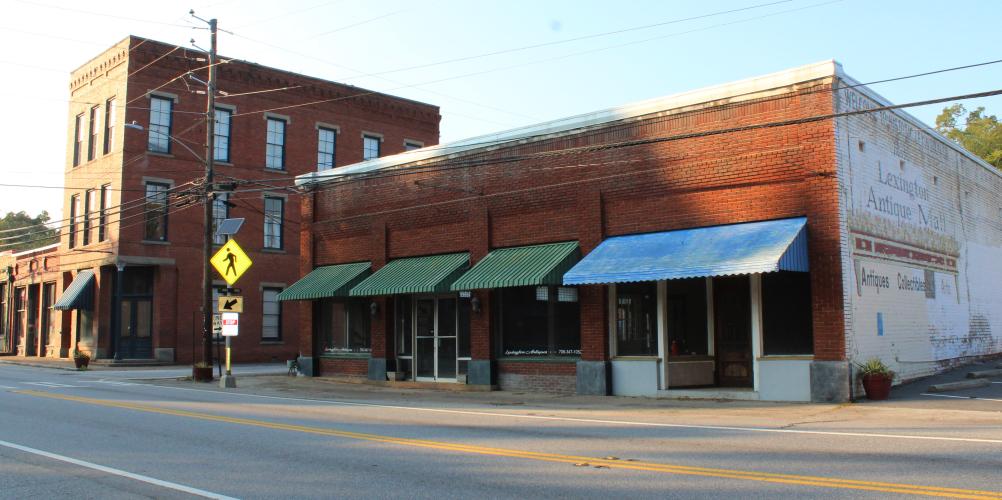 The exterior of the building being turned into a new restaurant in downtown Lexington, Georgia on Sept. 18, 2025. The building used to be an antique store owned by Ronnie Boggs before he sold it in 2022. (photo/Emily Adams)