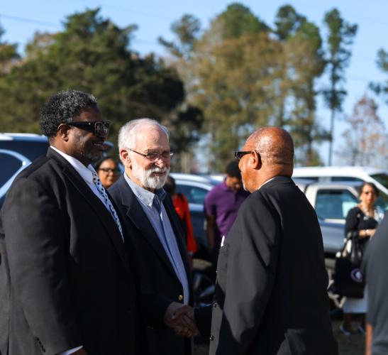 Pastor David Bell greets Ronnie Boggs, mayor of Lexington, before the rededication service at St. Paul Methodist Church in Lexington on Sunday, Nov. 16, 2025. Bell read Scripture during the service. (Photo/Susanna Johnson)