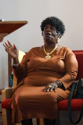 Elouise Clark worships during the rededication service at St. Paul Methodist Church in Lexington on Sunday, Nov. 16, 2025. The service included music from Shamar Stevens and 'The Voices.' (Photo/Susanna Johnson)